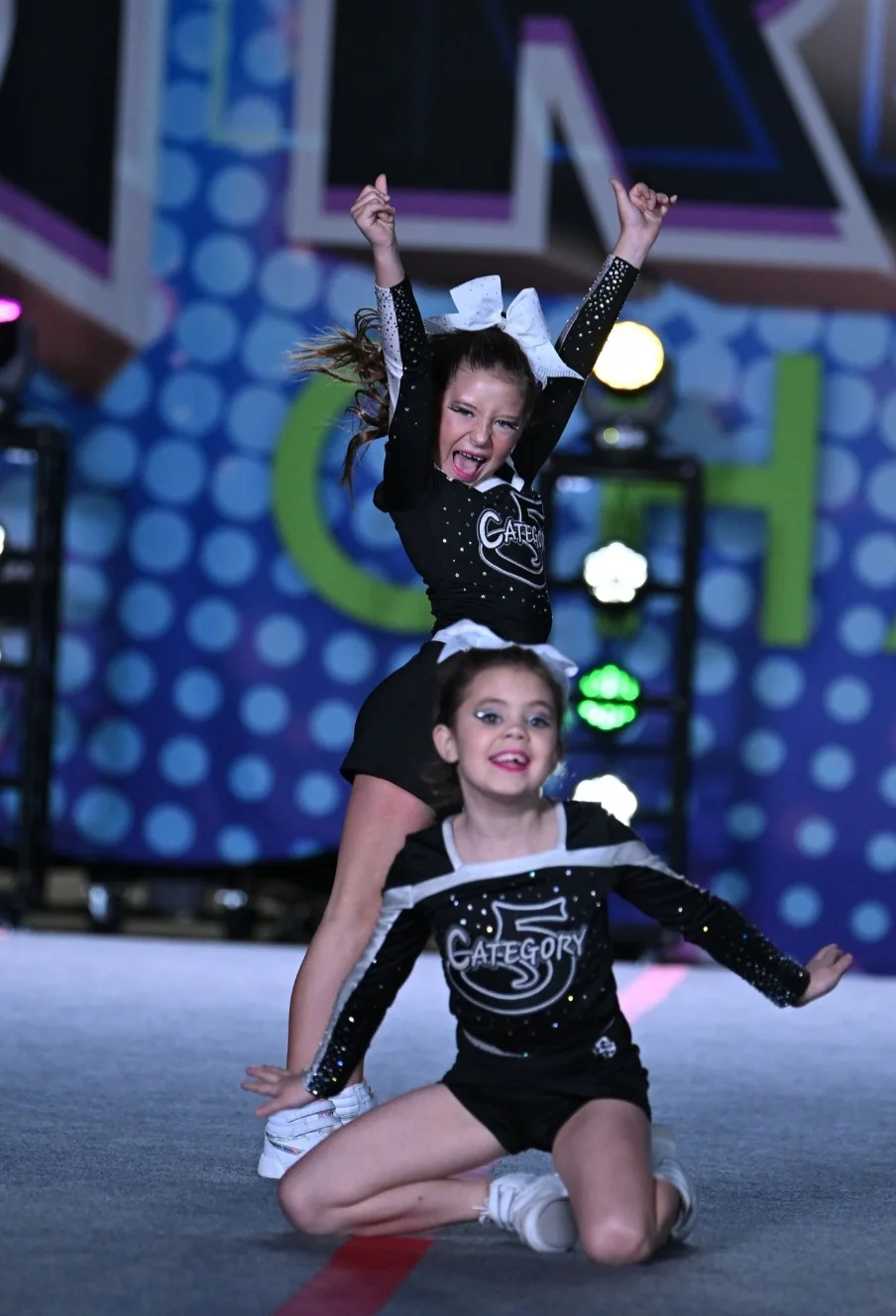 Category 5 athletes hitting the final moment of a competition routine